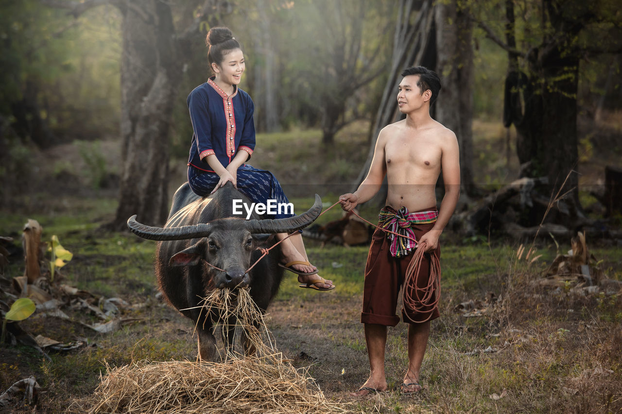 Pre wedding shoot inside garden in thai traditional dress costumes