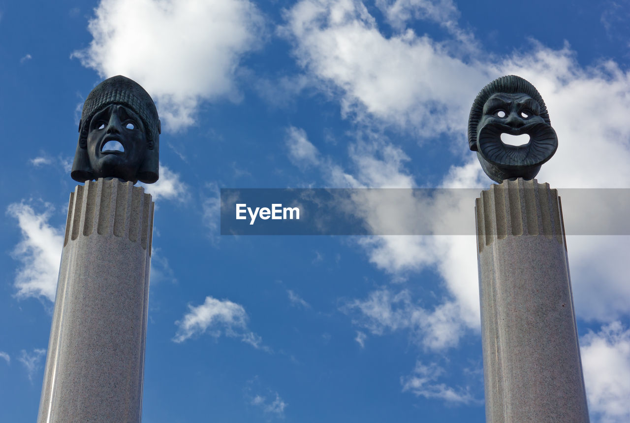 Low angle view of statue against sky