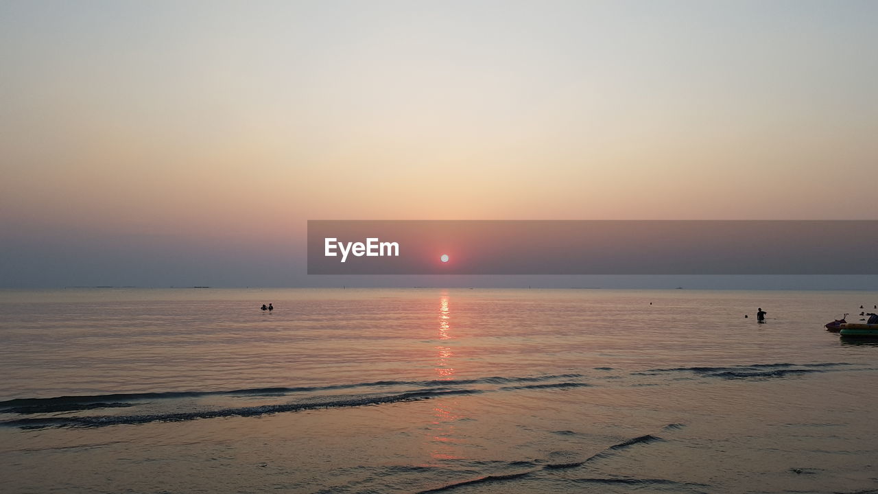 SCENIC VIEW OF SEA DURING SUNSET