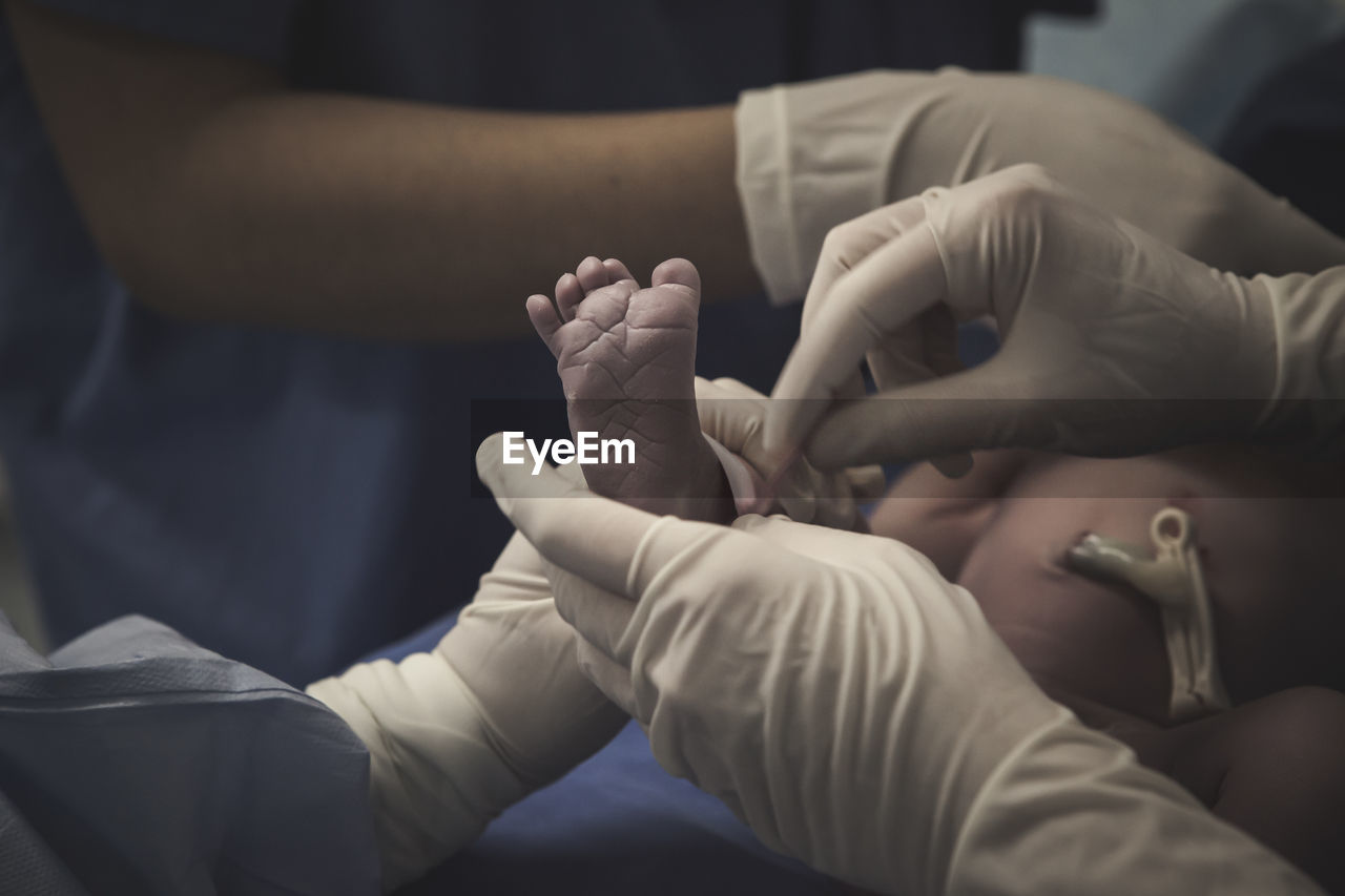 First moment of a newborn, labor in a hospital. after birth.