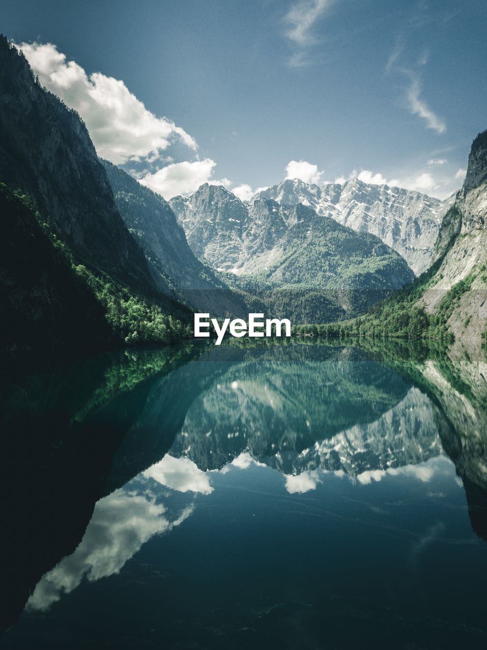 Scenic view of lake with mountain reflection