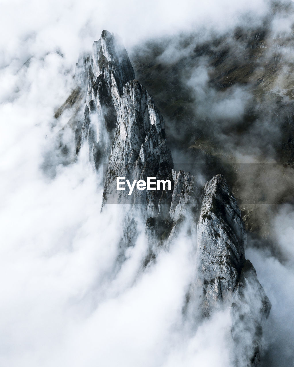 Scenic view of clouds over mountain