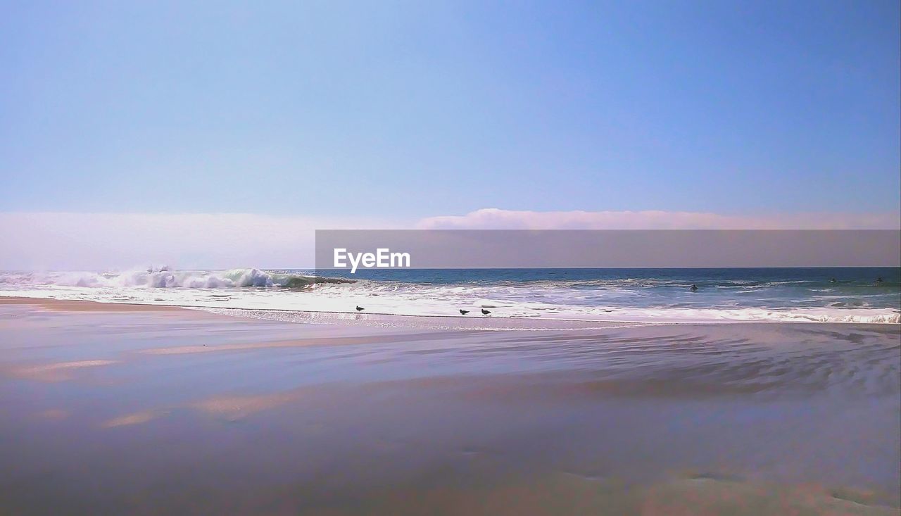 VIEW OF BEACH AGAINST CLEAR SKY