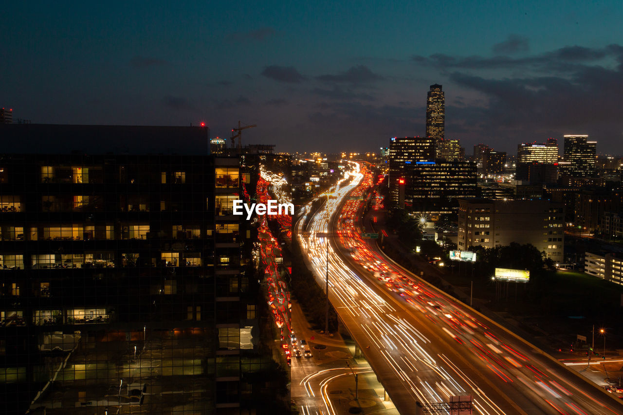 High angle view of light trails on city street