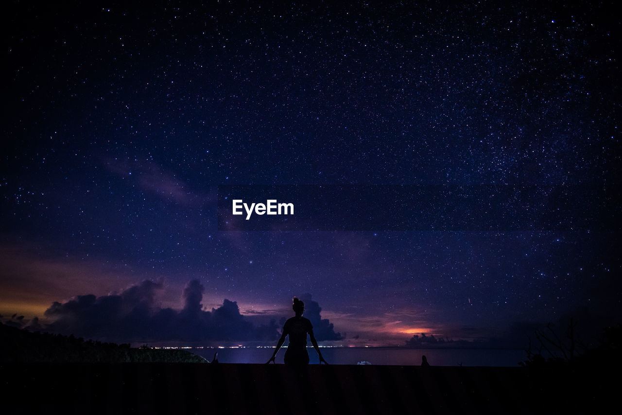 Scenic view of star field against sky at night