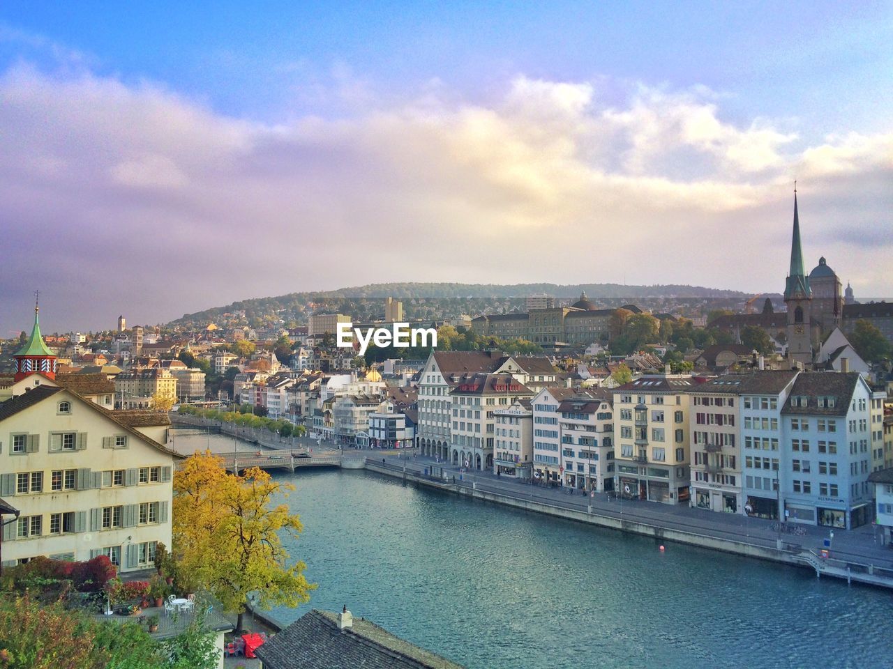 Limmat river canal in city against sky