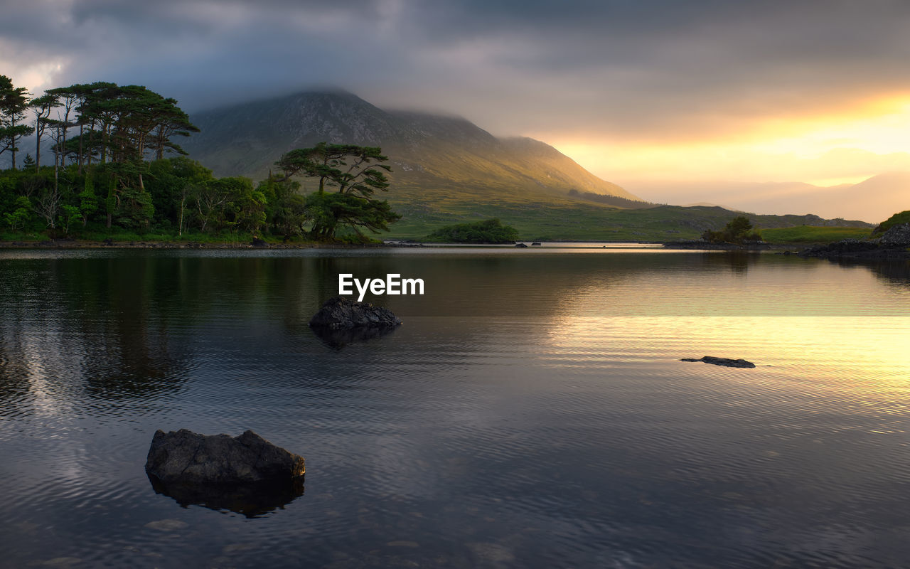 Dramatic sunrise landscape at twelve pines, connemara, galway, ireland 