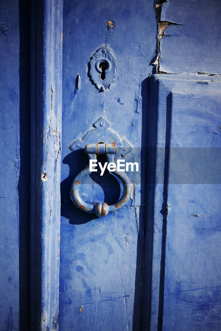 Knocker on blue door