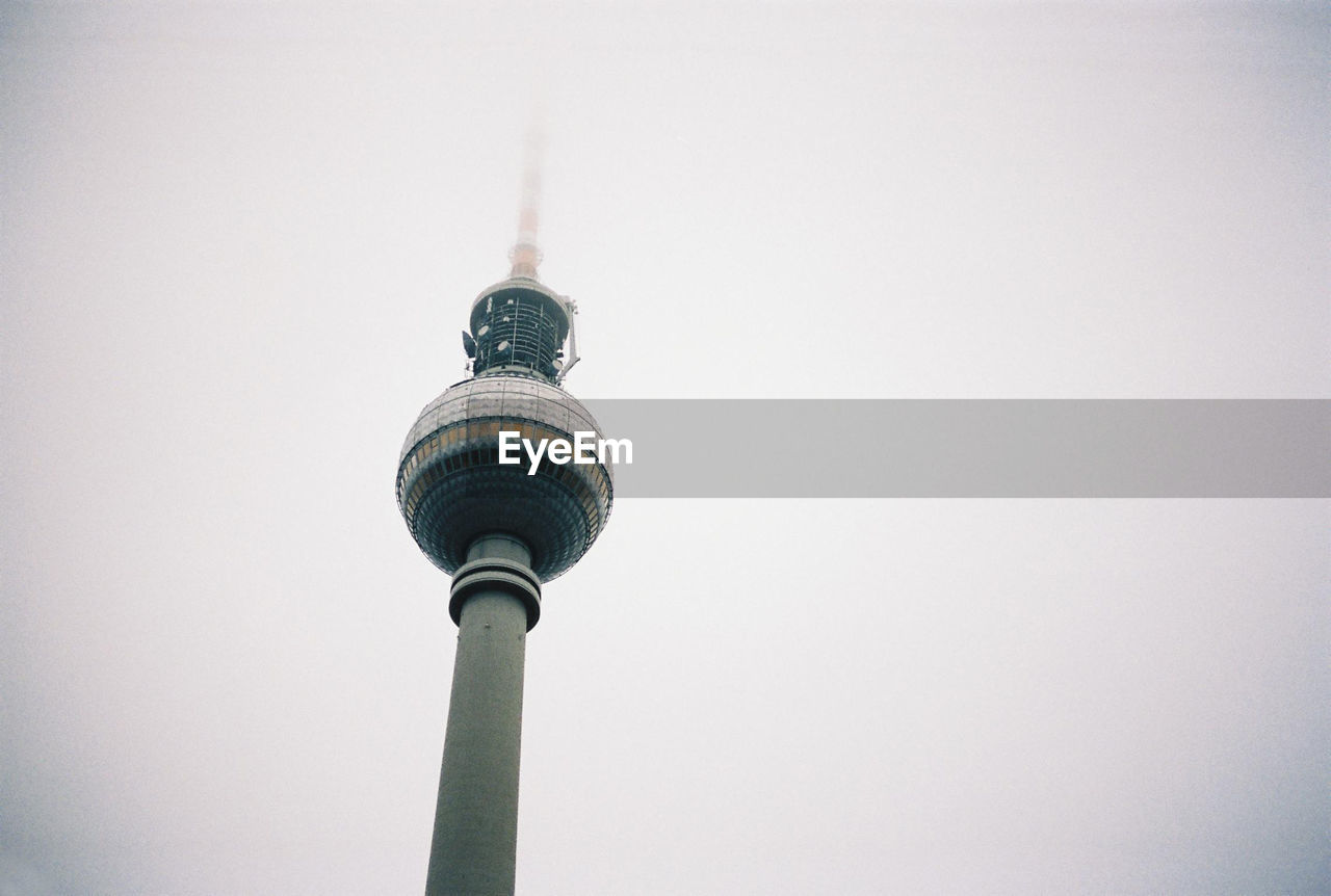 Low angle view of fernsehturm against clear sky