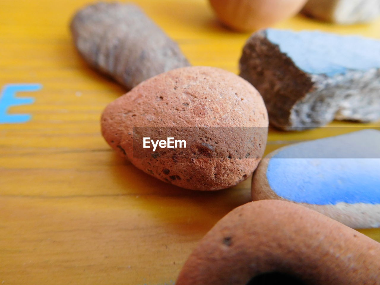 High angle view of rocks on table