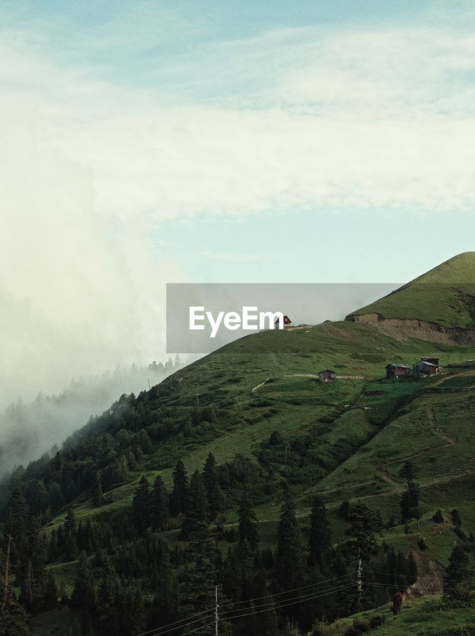 SCENIC VIEW OF MOUNTAIN AGAINST SKY