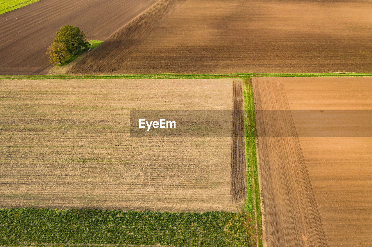 Agriculture with different small fields and arable land in europe seen from above