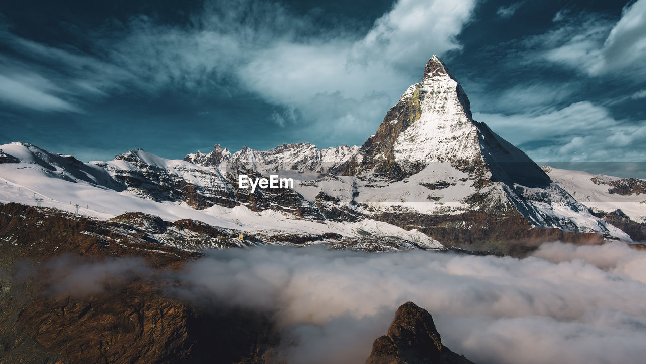 Panoramic view of the matterhorn, typical cloud formation.