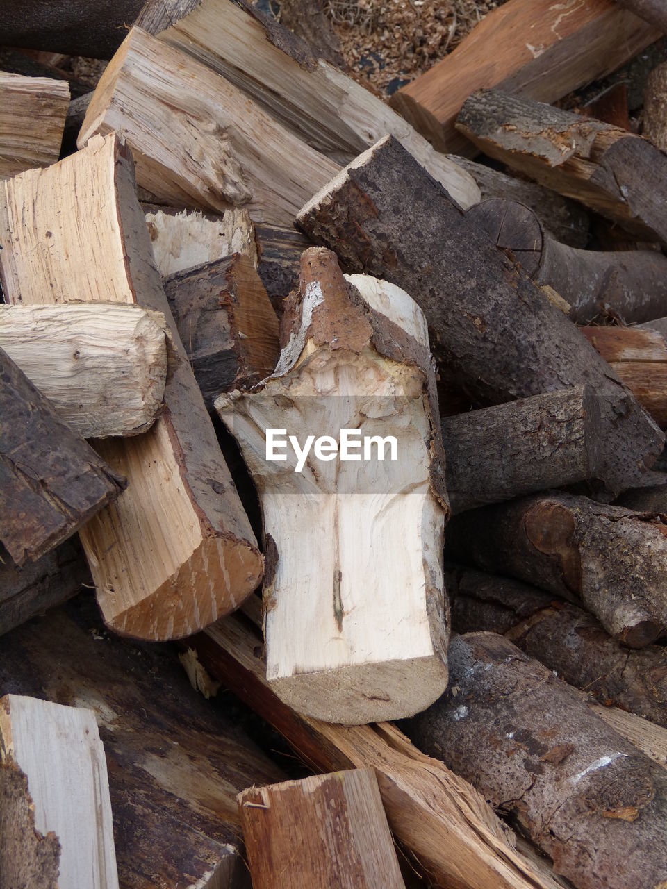 CLOSE-UP OF LOGS STACK