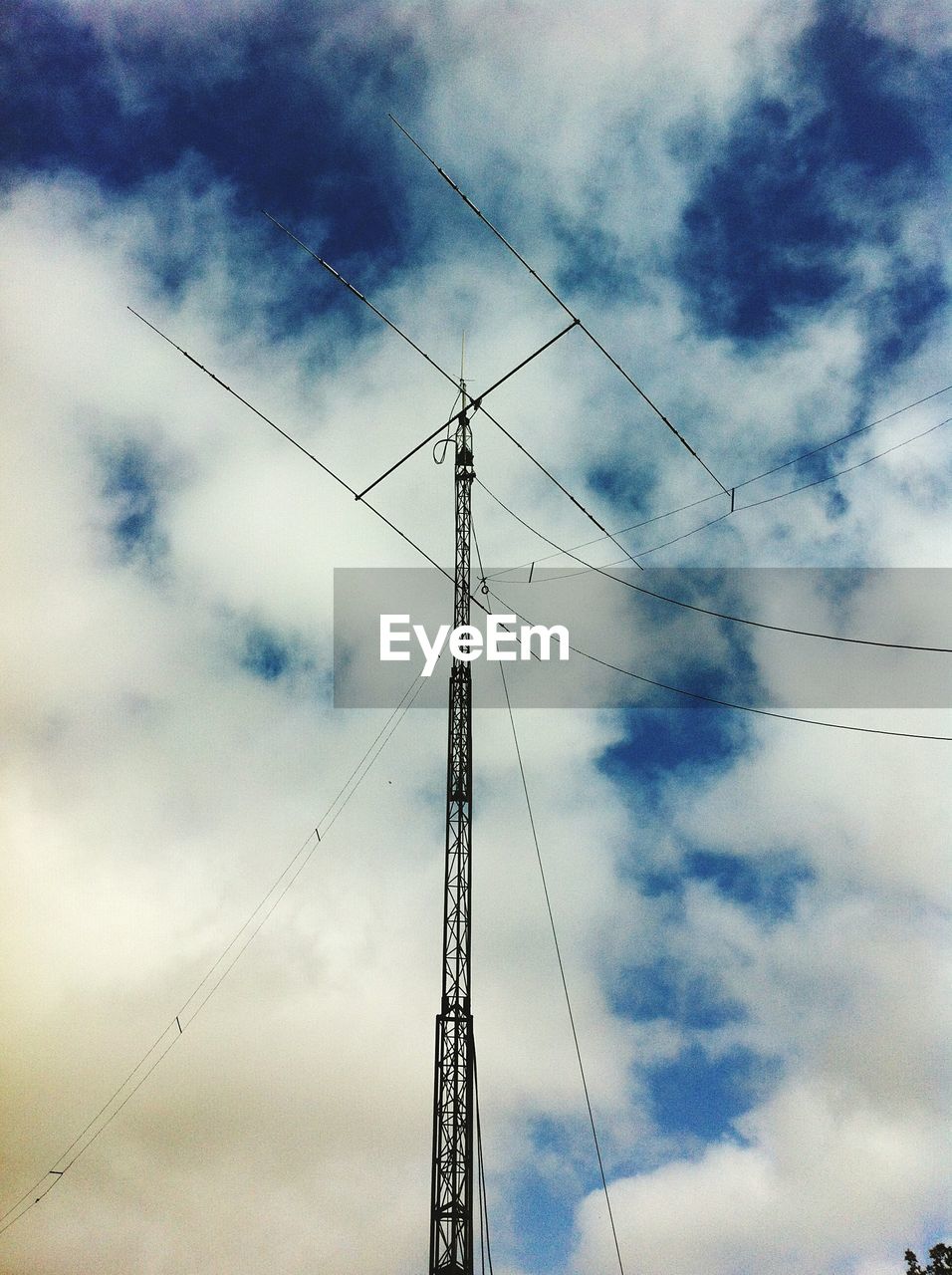 Low angle view of antenna against sky