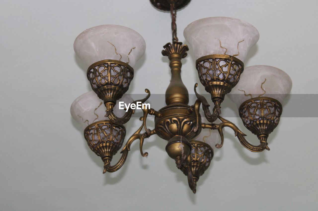 CLOSE-UP OF ILLUMINATED CHANDELIER