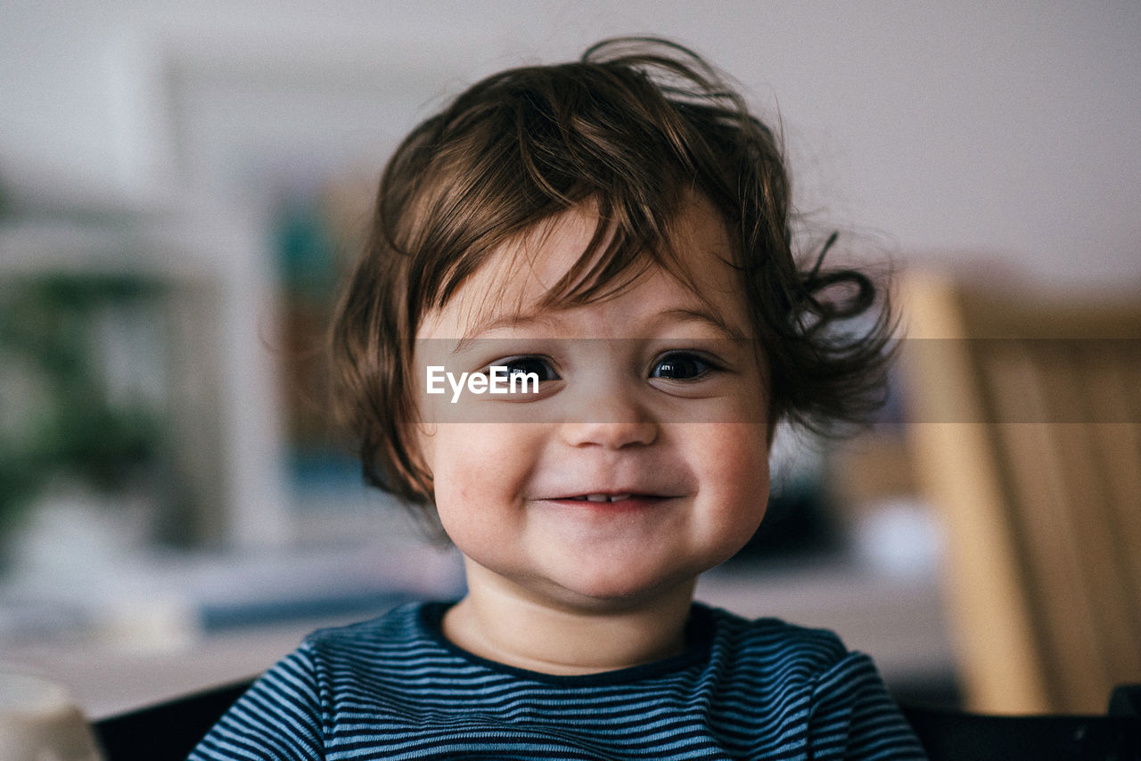 Portrait of cute boy at home