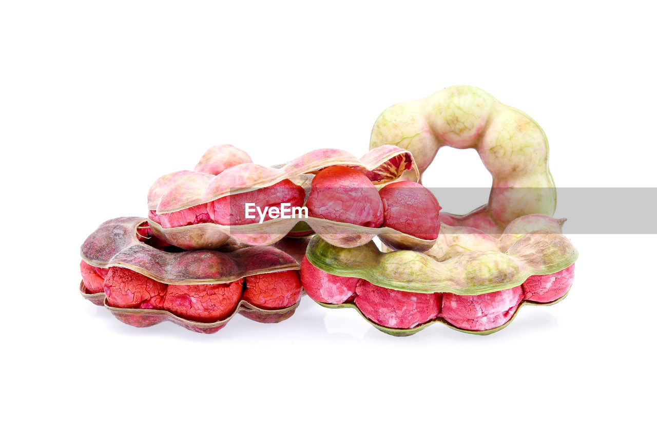 Close-up of fruits against white background