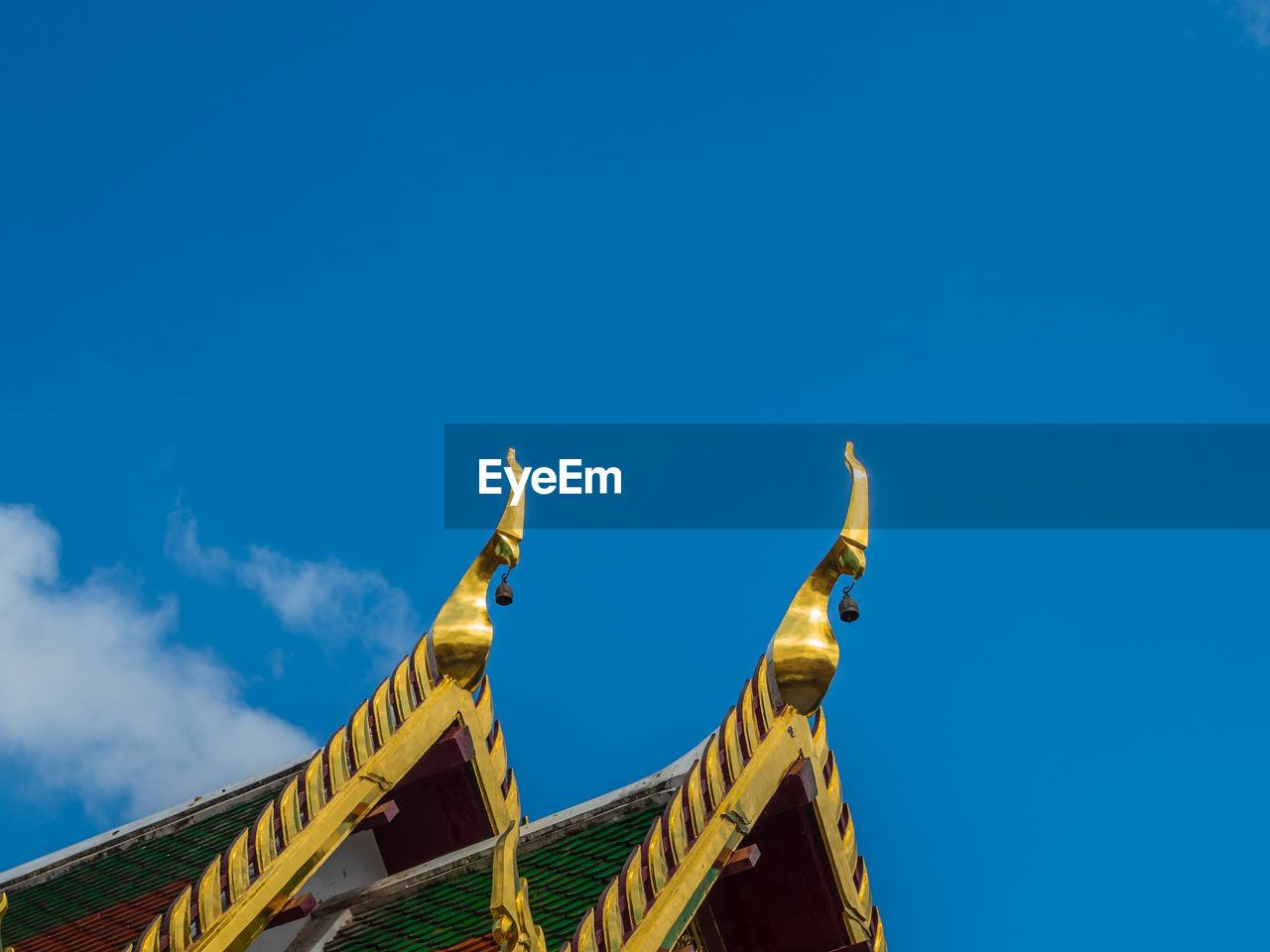 Low angle view of built structure against blue sky