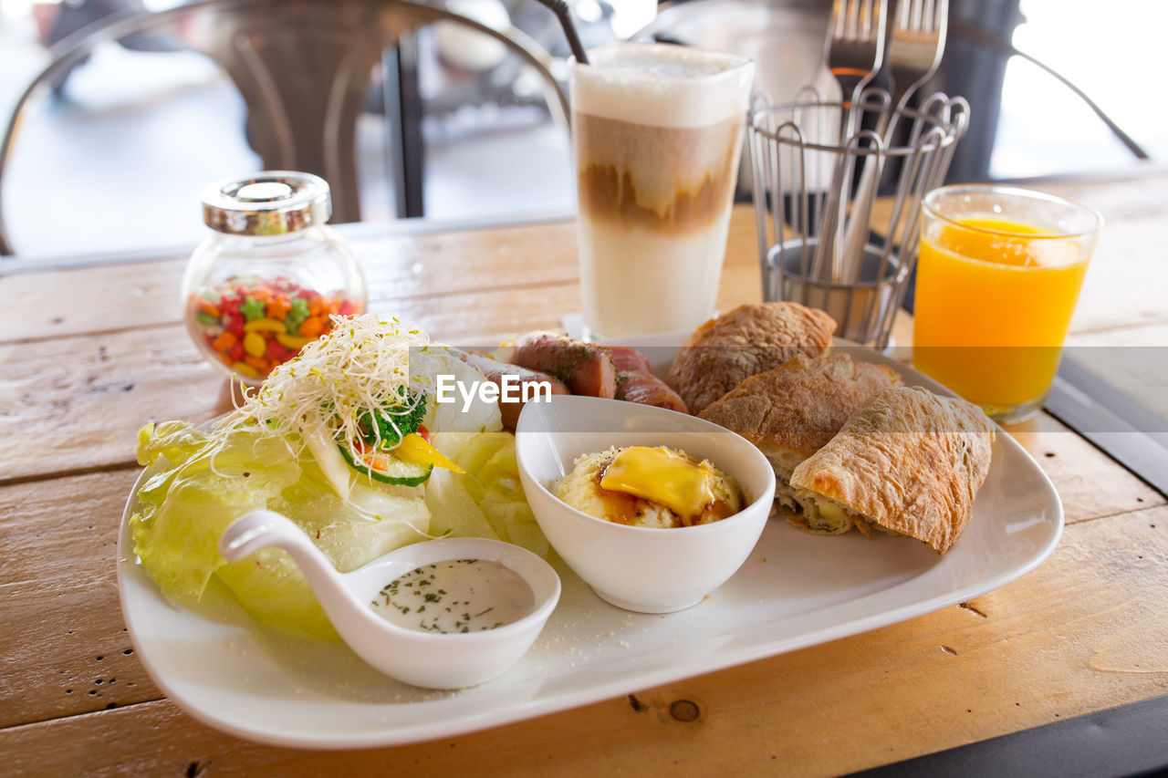 Close-up of breakfast served on table