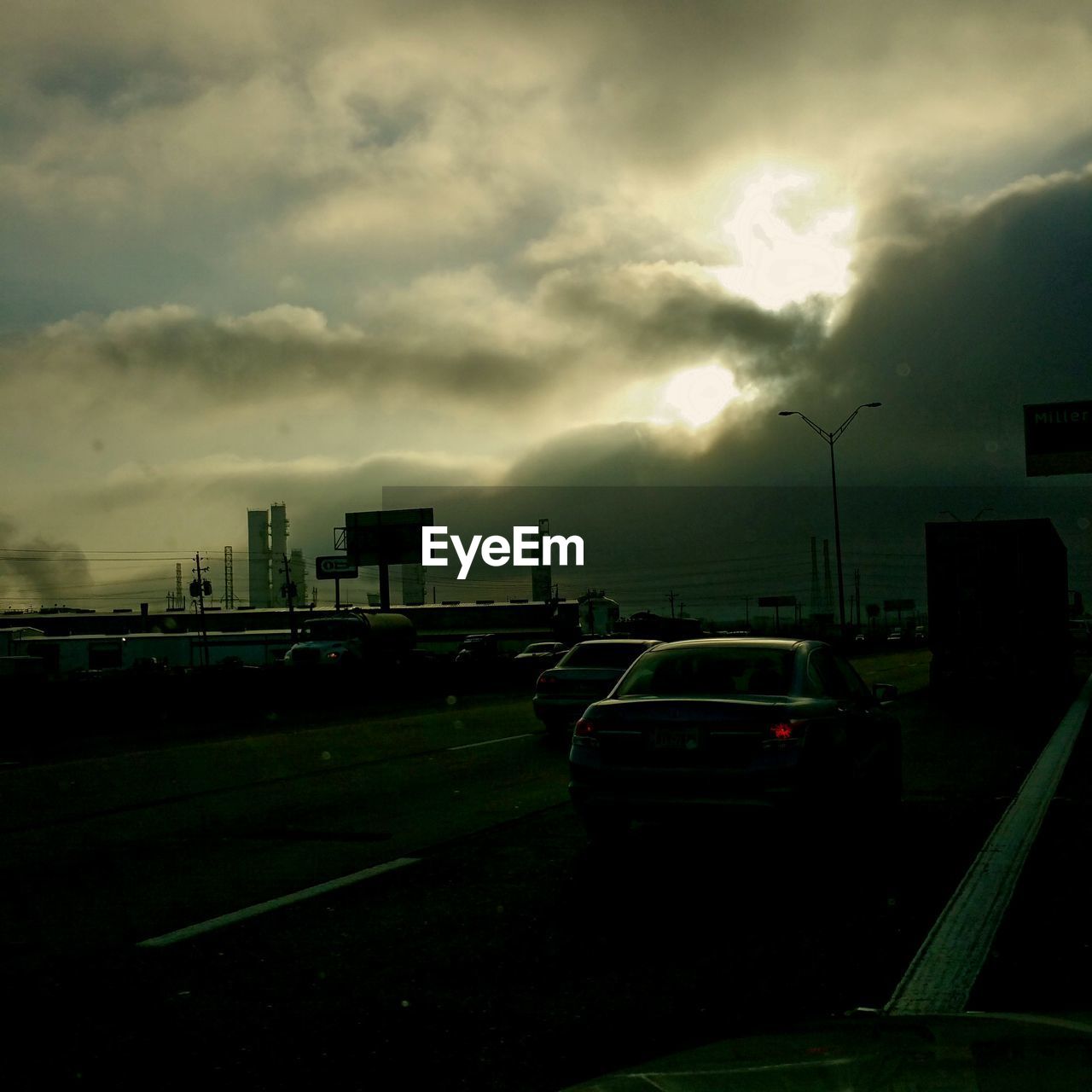 VIEW OF CLOUDY SKY OVER ROAD