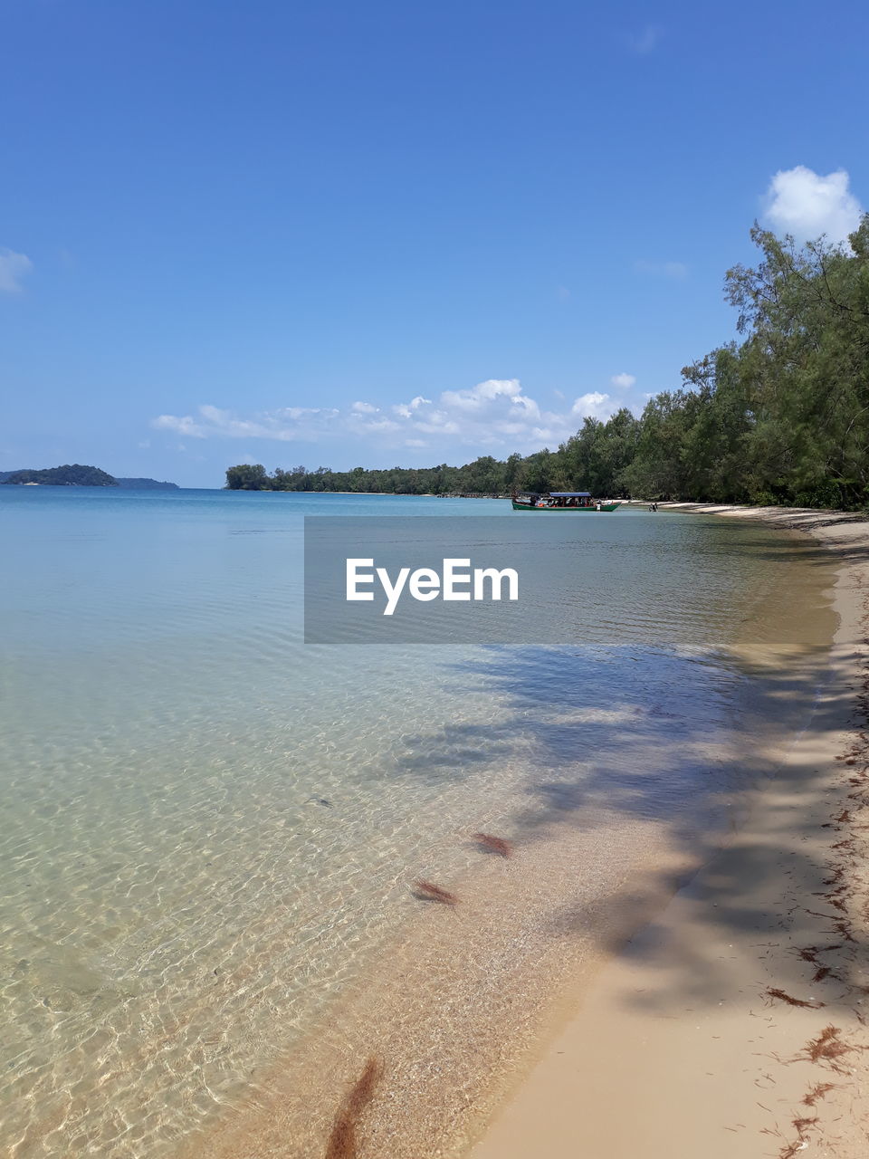 SCENIC VIEW OF SEA AGAINST BLUE SKY