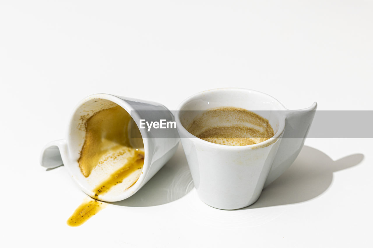 high angle view of coffee cup against white background
