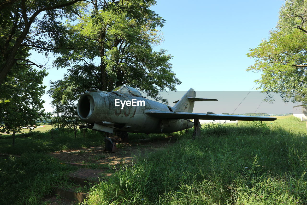 VEHICLE PARKED ON FIELD