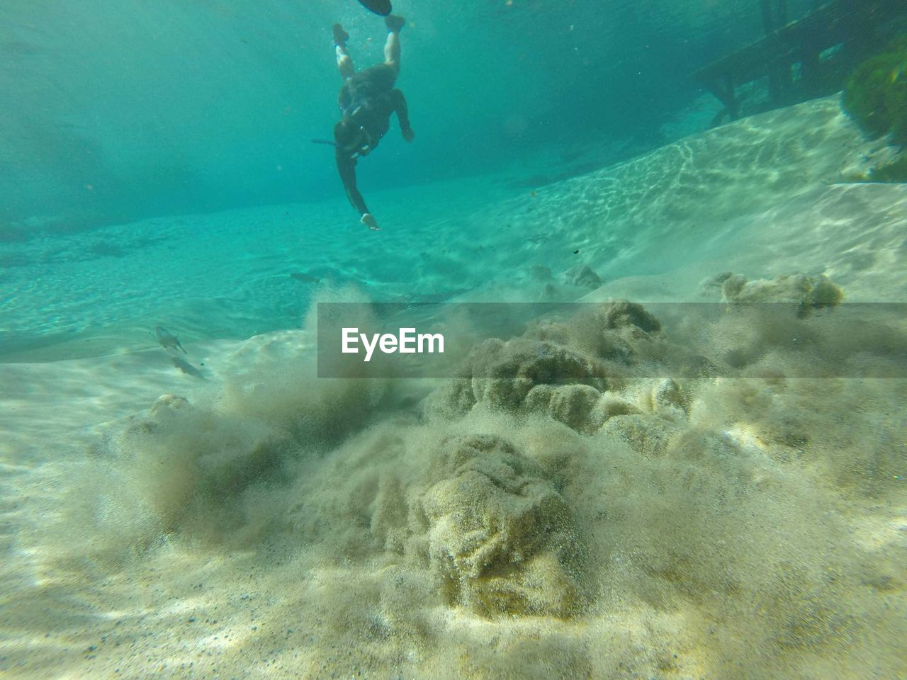 Man swimming in river