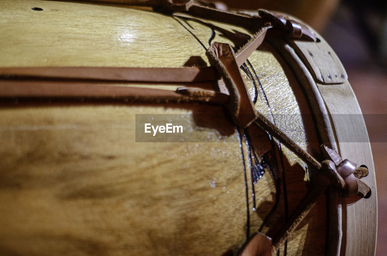 drum, close-up, membranophone, bridle, hand, wood, musical instrument, drum - percussion instrument, music, string instrument, horse tack, hand drum, indoors, arts culture and entertainment