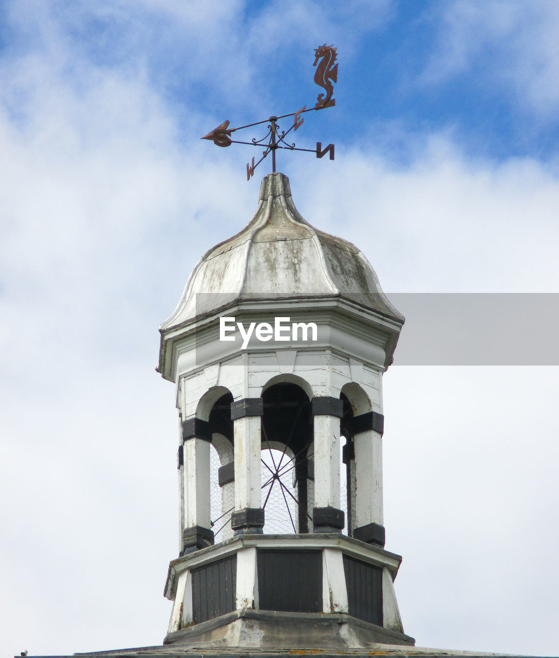architecture, tower, sky, built structure, building exterior, weather vane, nature, steeple, cloud, no people, bell tower, landmark, low angle view, day, building, history, the past, outdoors, cross, travel destinations, religion