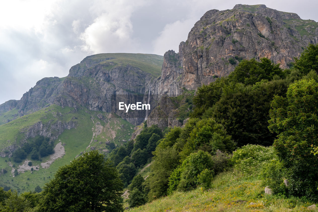 Scenic view of rocky mountains against sky, bulgaria, botev peak. 