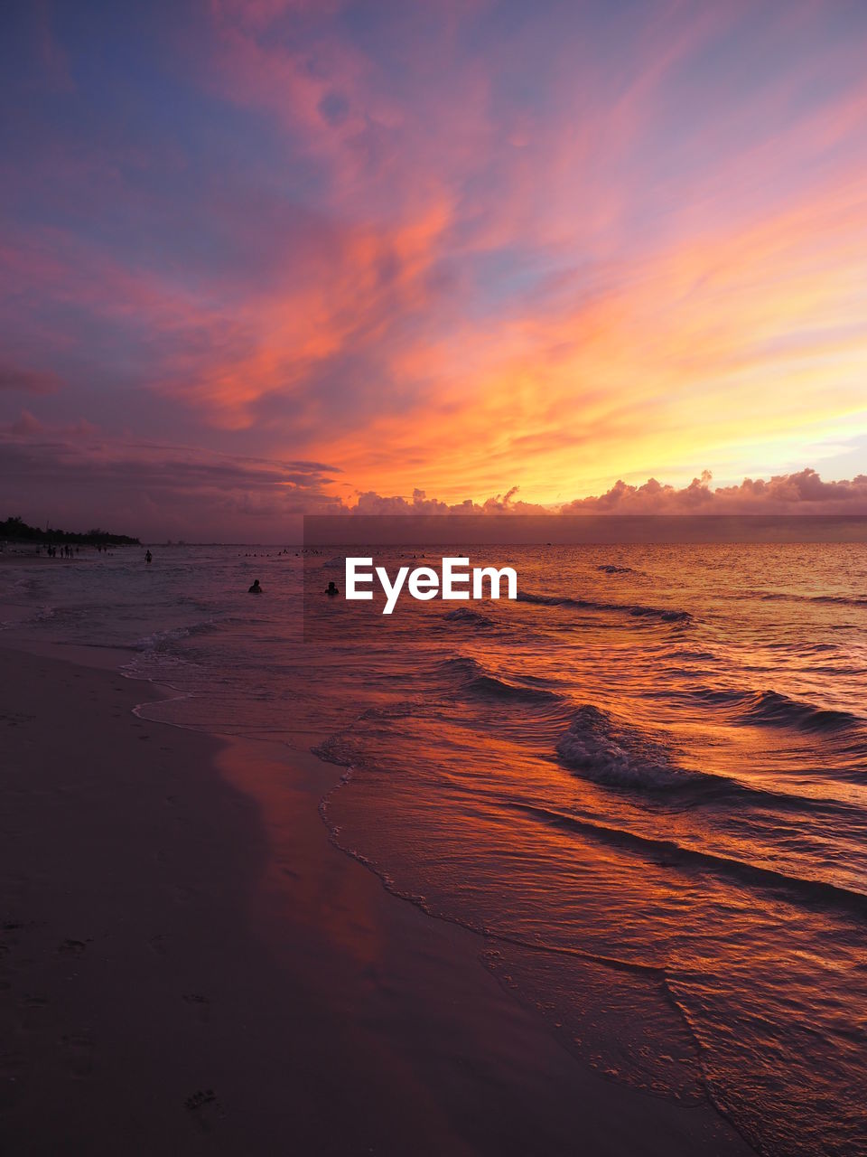 Scenic view of sea against sky at sunset
