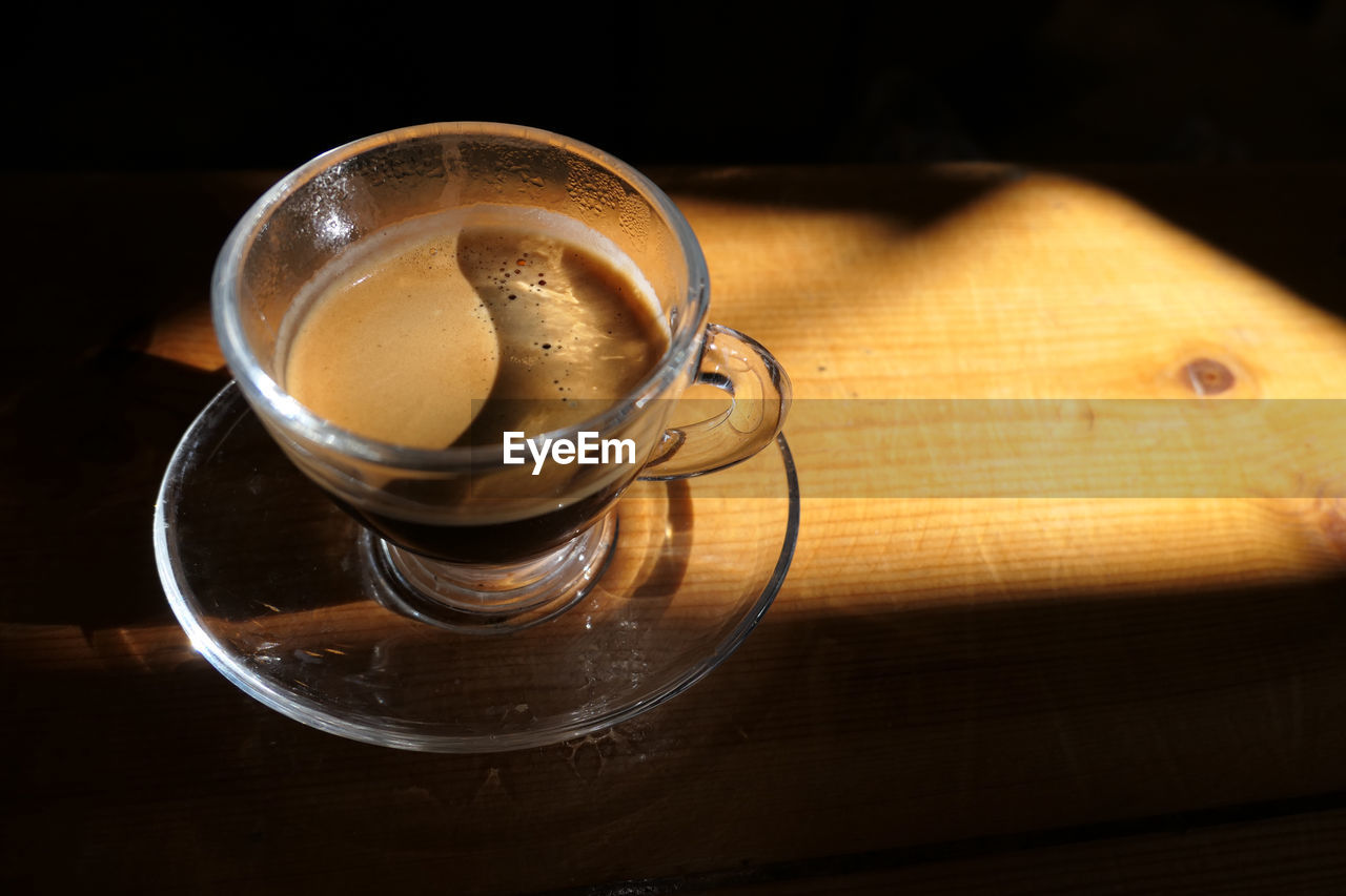 Close-up of coffee cup on table