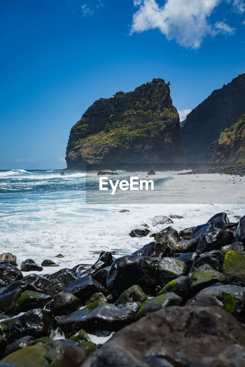 Rocky beach at rocha do navio nature reserve, madeira island, portugal