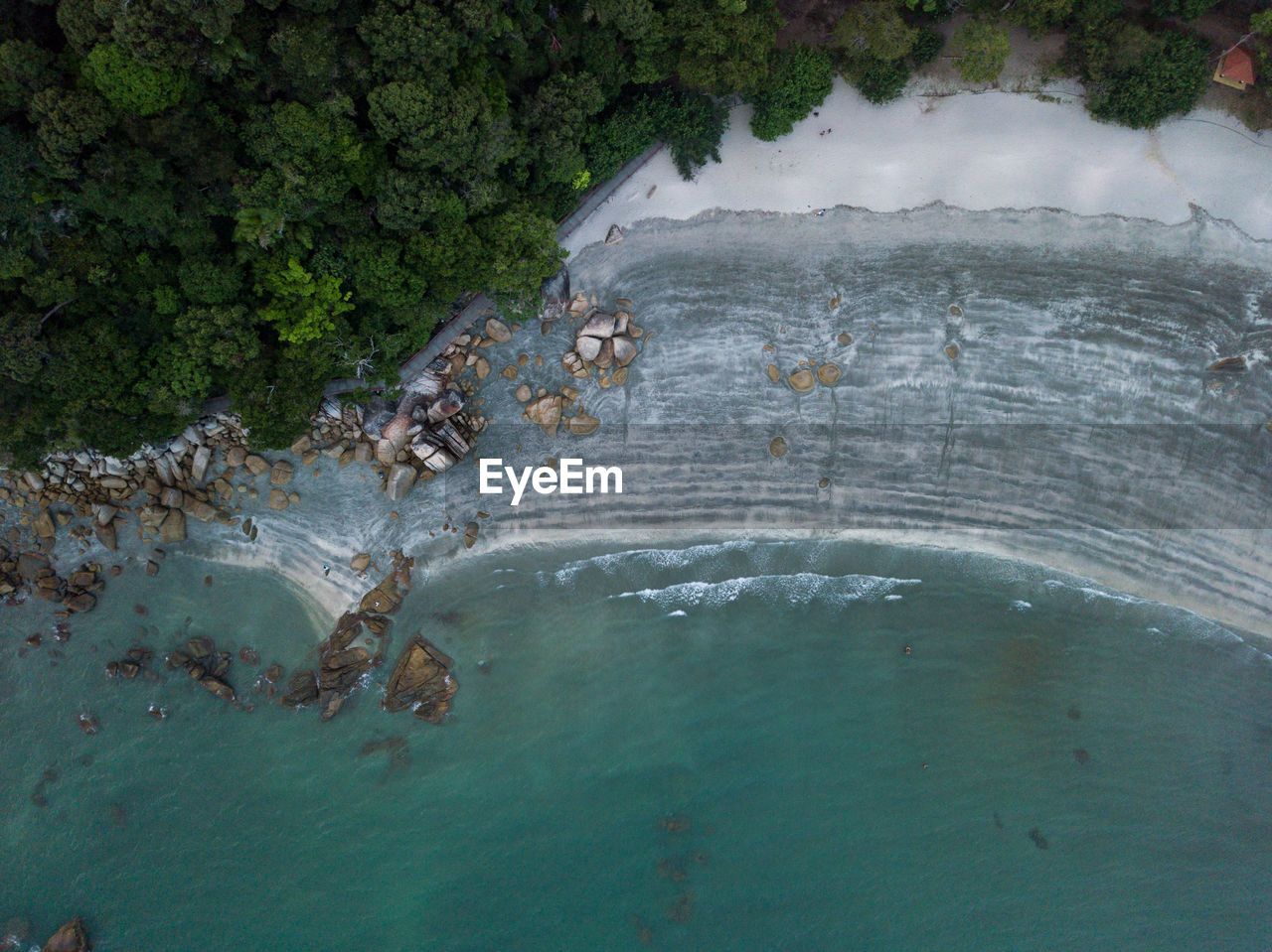 High angle view of water flowing through rocks