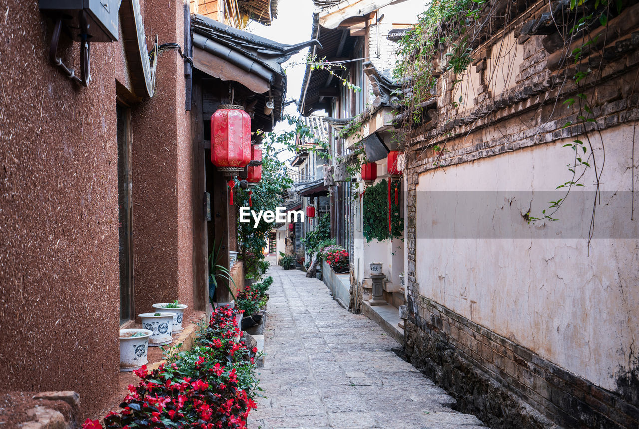 NARROW STREET AMIDST BUILDINGS