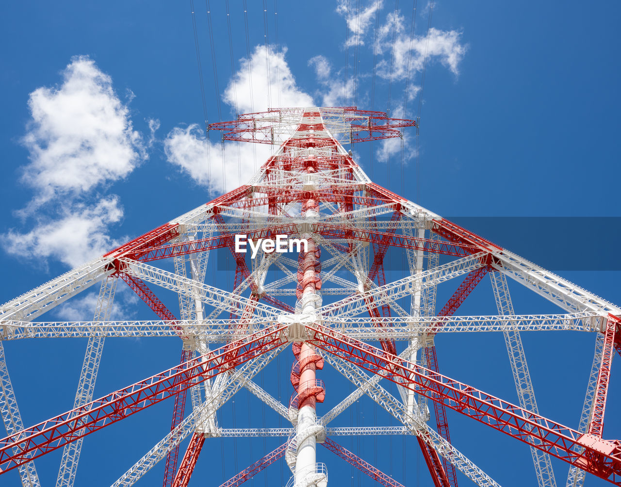 LOW ANGLE VIEW OF ROLLERCOASTER AGAINST SKY