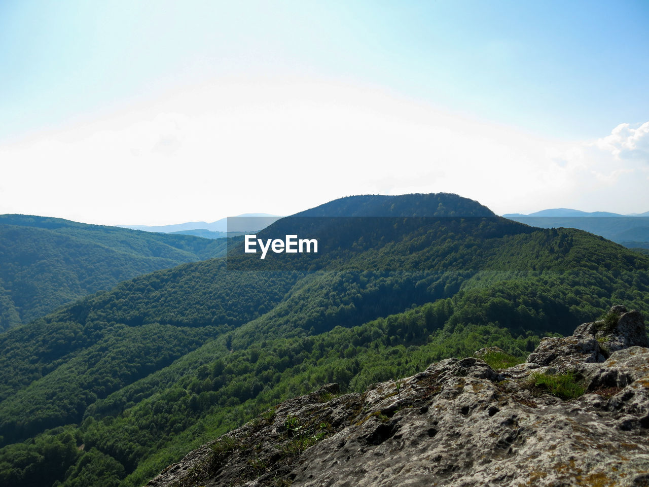 SCENIC VIEW OF MOUNTAIN AGAINST SKY