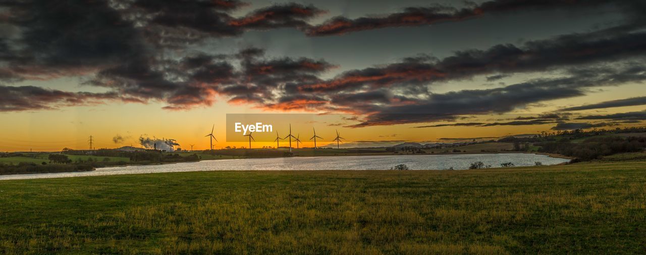 Loch Gelly #Panorama Canon Canonphotography Colorful Grass Lake Lake View Loch Gelly Panorama Reflection Scotland Sigma Sun Sunset Water Wide Shot Wind Wind Turbine