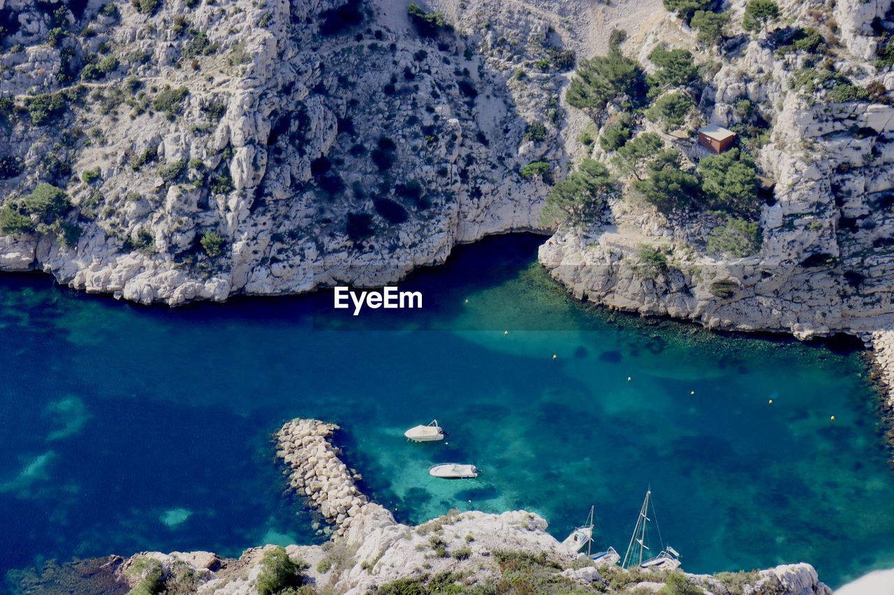 High angle view of rock formation in sea