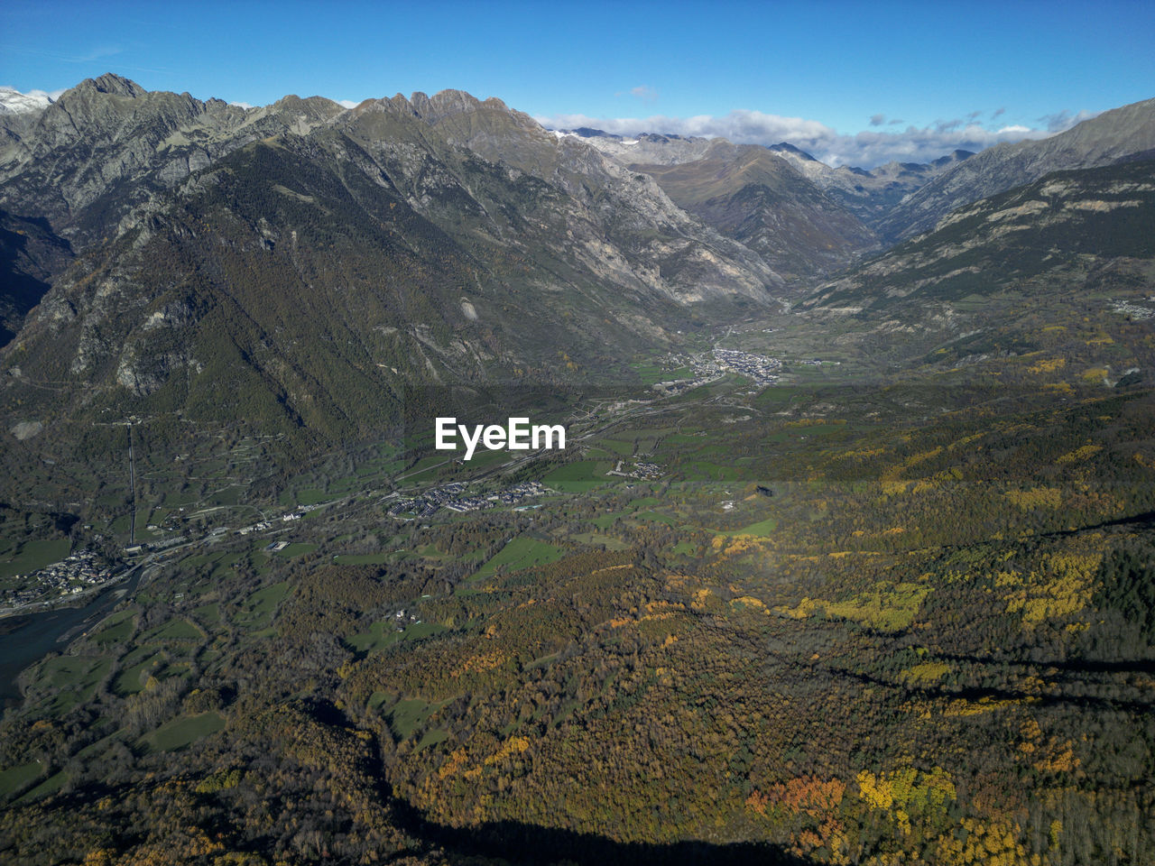 mountain, environment, landscape, scenics - nature, wilderness, mountain range, beauty in nature, nature, land, sky, ridge, no people, non-urban scene, travel destinations, tranquility, plant, tranquil scene, mountain pass, travel, valley, outdoors, day, tree, mountain peak, snow, cold temperature, rock, clear sky, blue, activity, forest, winter, tourism, coniferous tree, plateau, pinaceae, sunlight, water