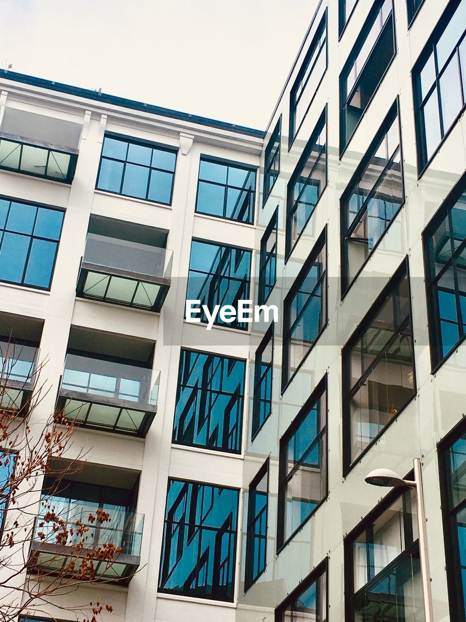 Low angle view of modern architecture against clear sky