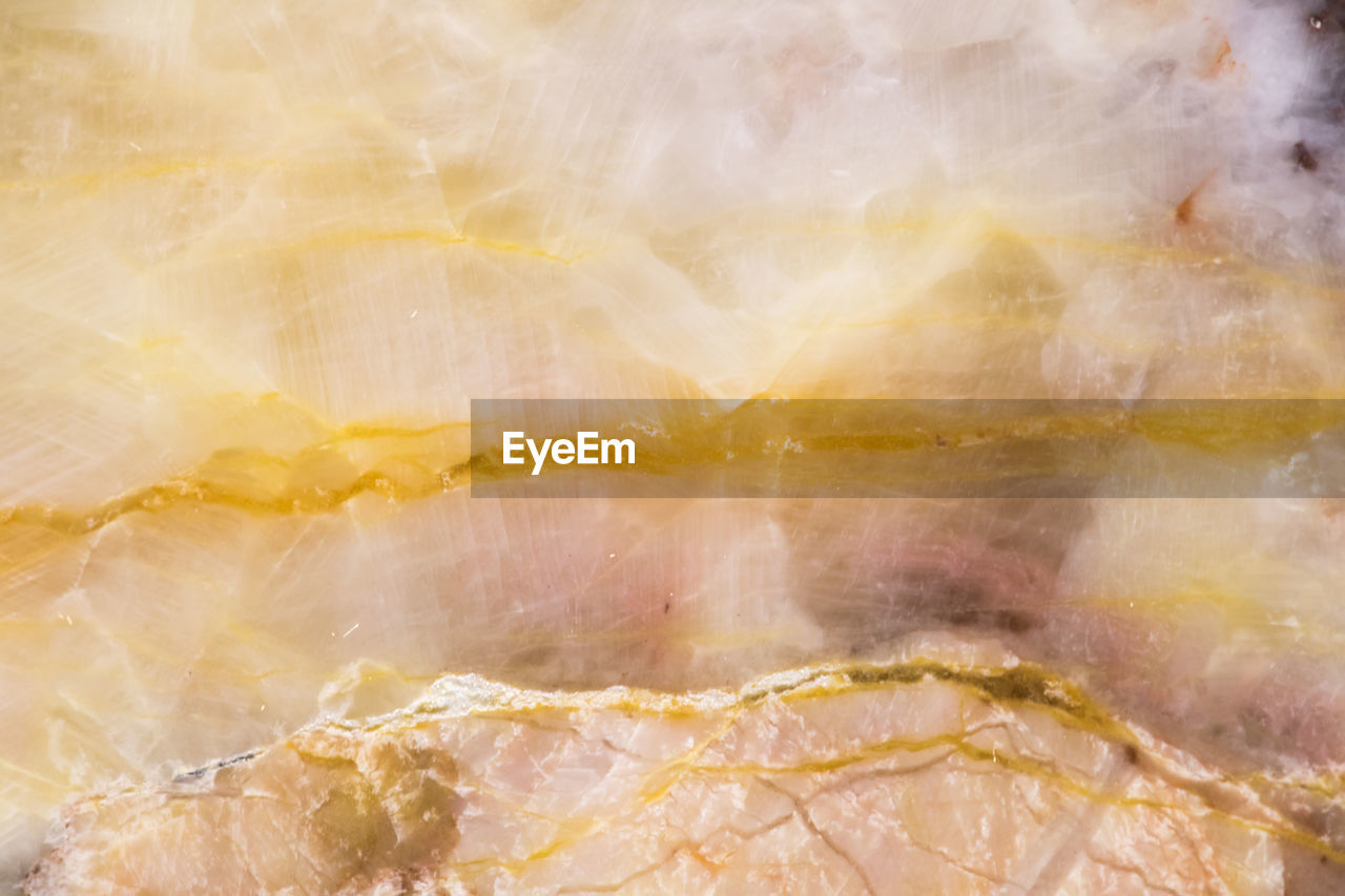 FULL FRAME SHOT OF ROCKS AGAINST WHITE BACKGROUND