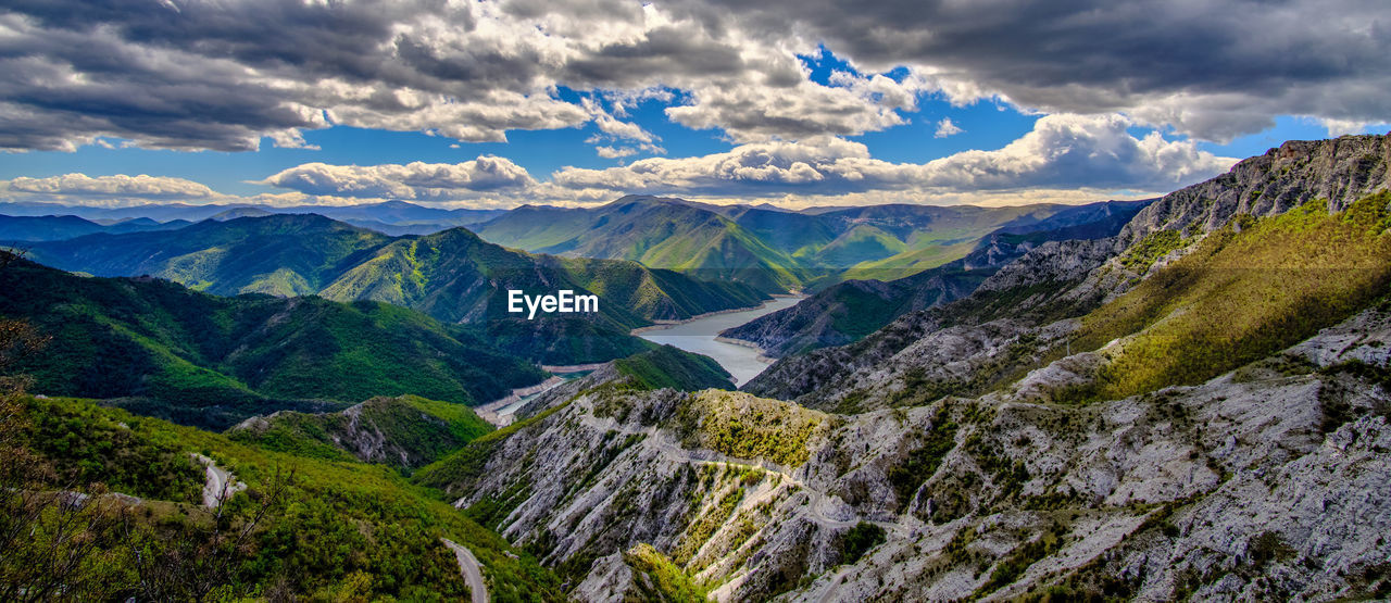 Panoramic view of mountains against sky