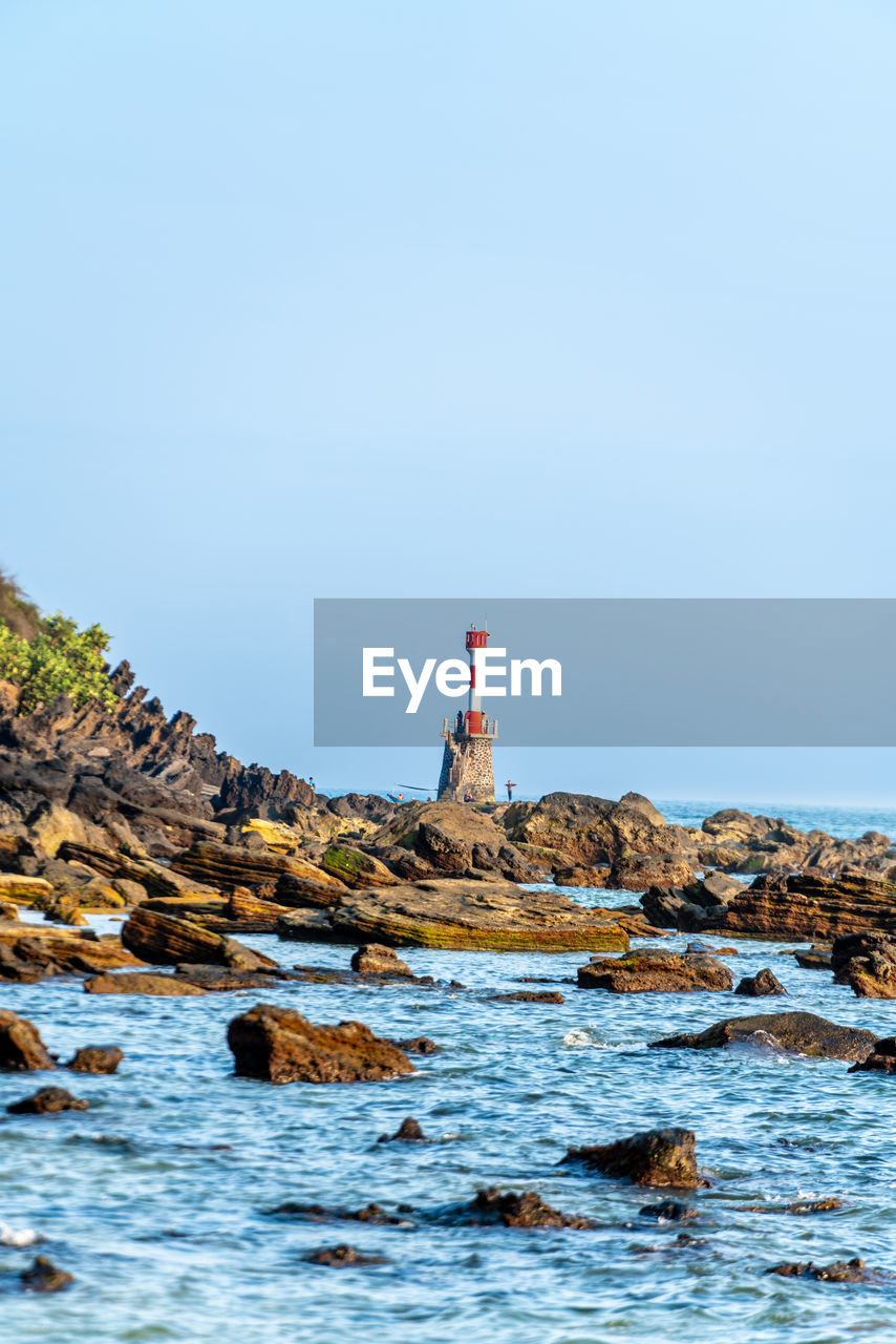 Volcanic rocks and reefs on the coast