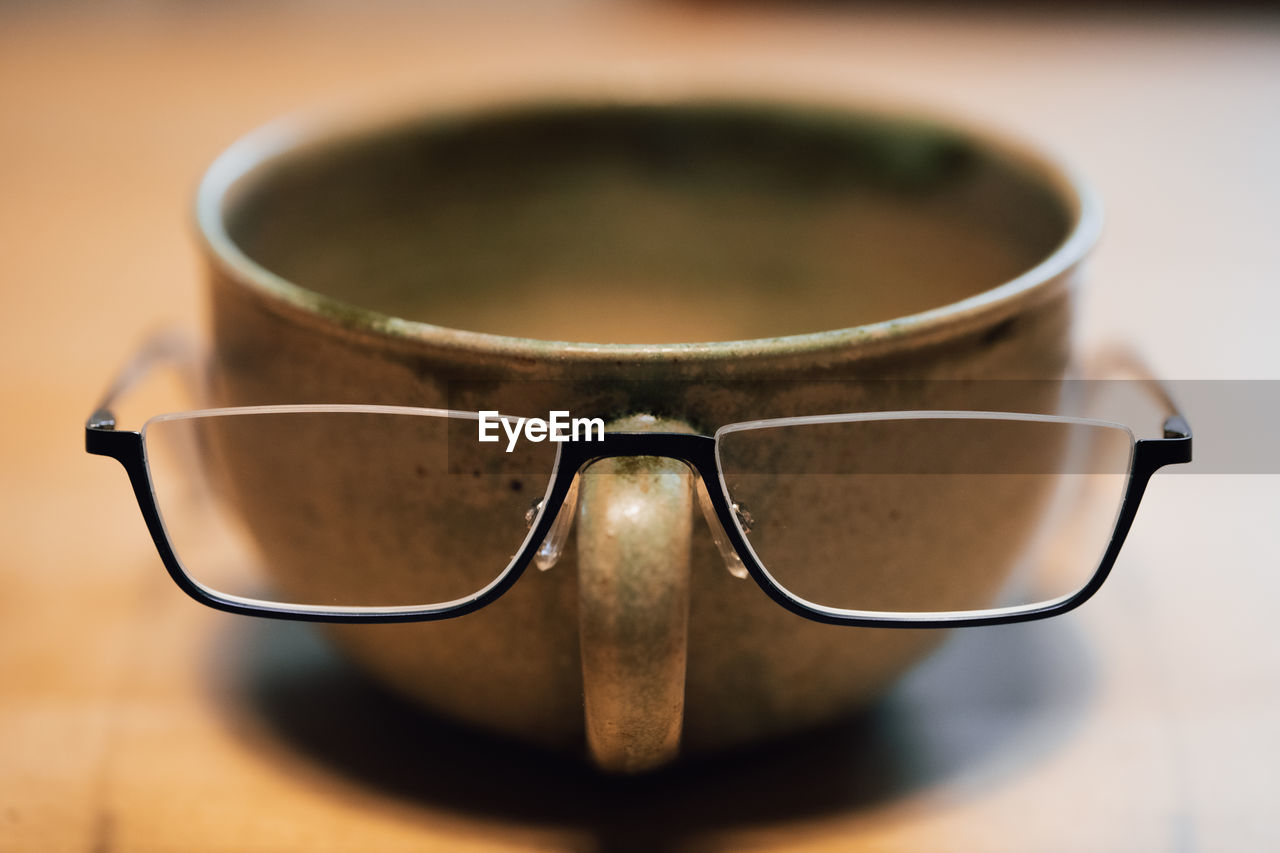 close-up of eyeglasses on table