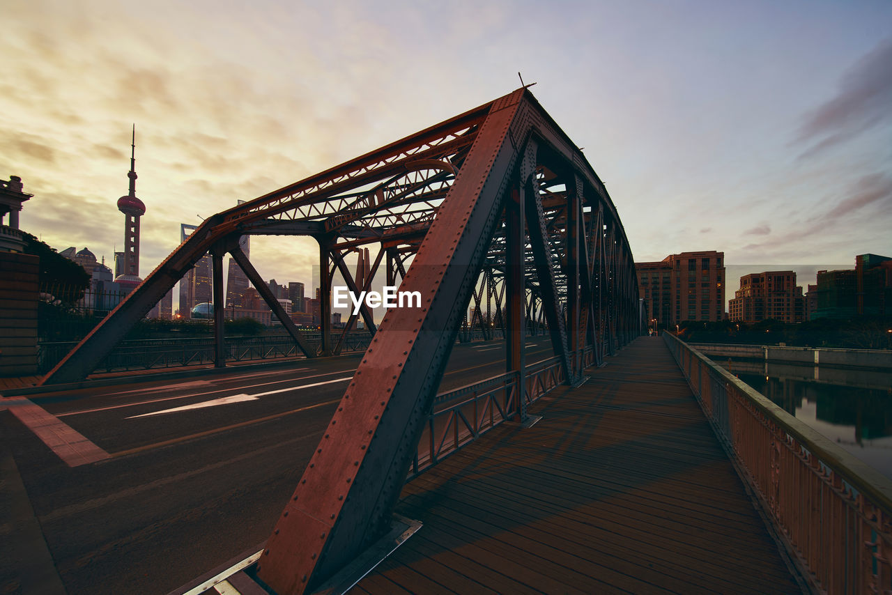 View of bridge against cloudy sky