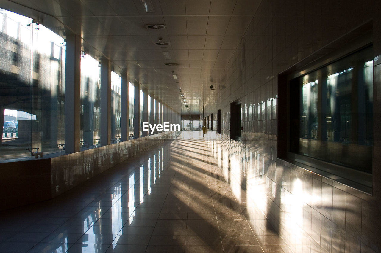 EMPTY CORRIDOR ALONG BUILDING