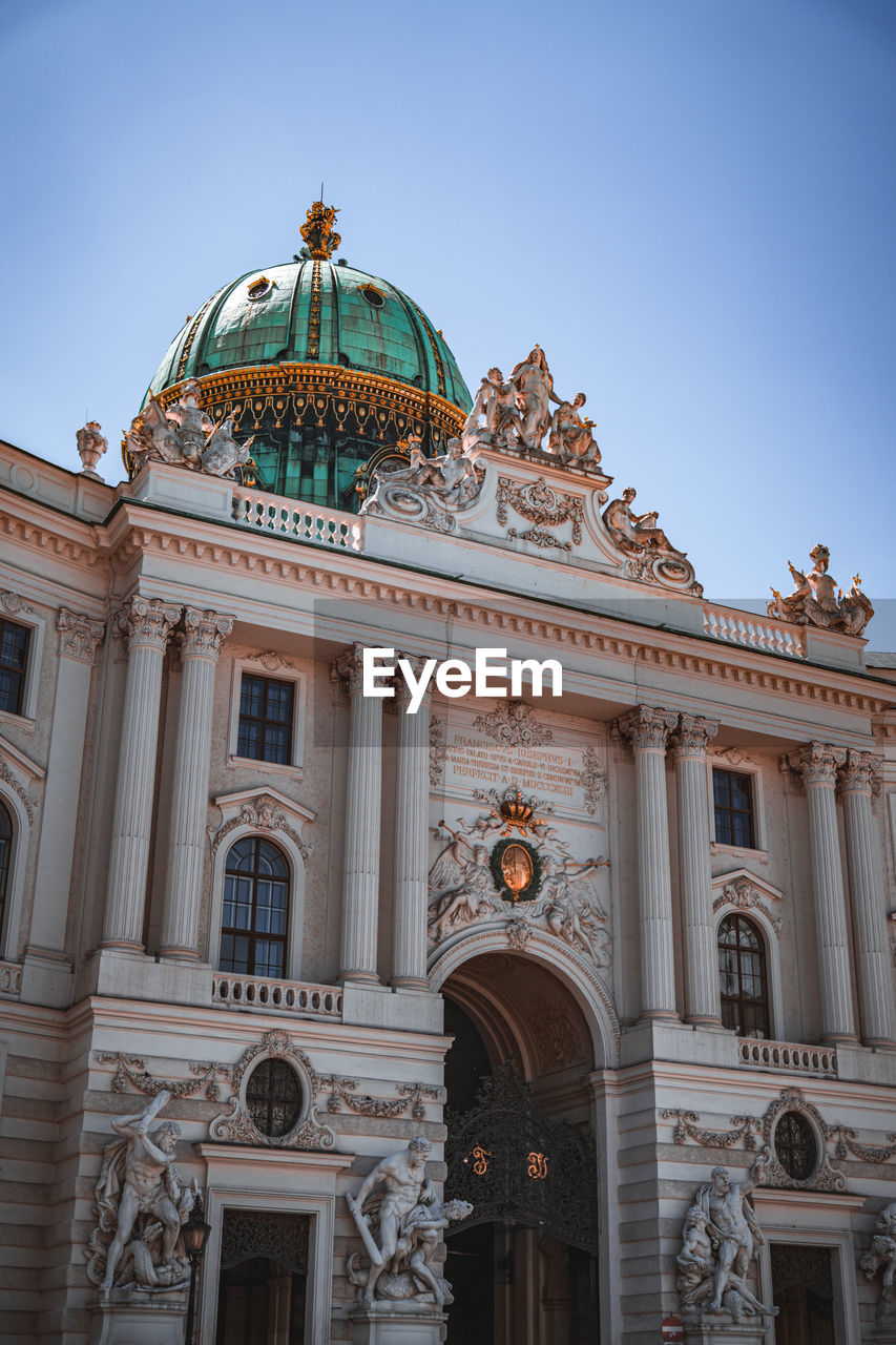 Low angle view of historic building against clear sky